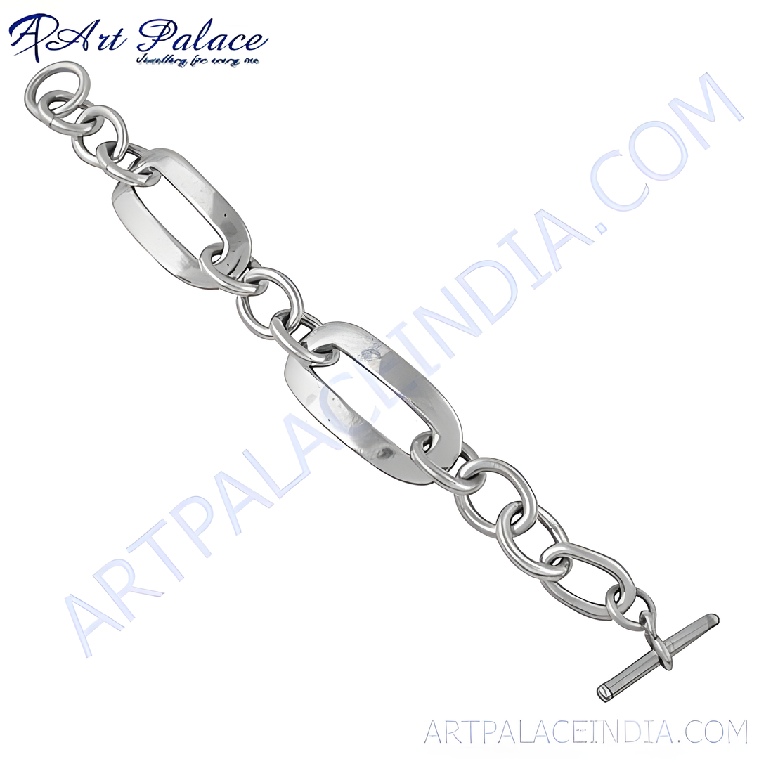 Sterling silver link chain bracelet with a polished finish and toggle clasp, ideal for women's daily wear jewelry.