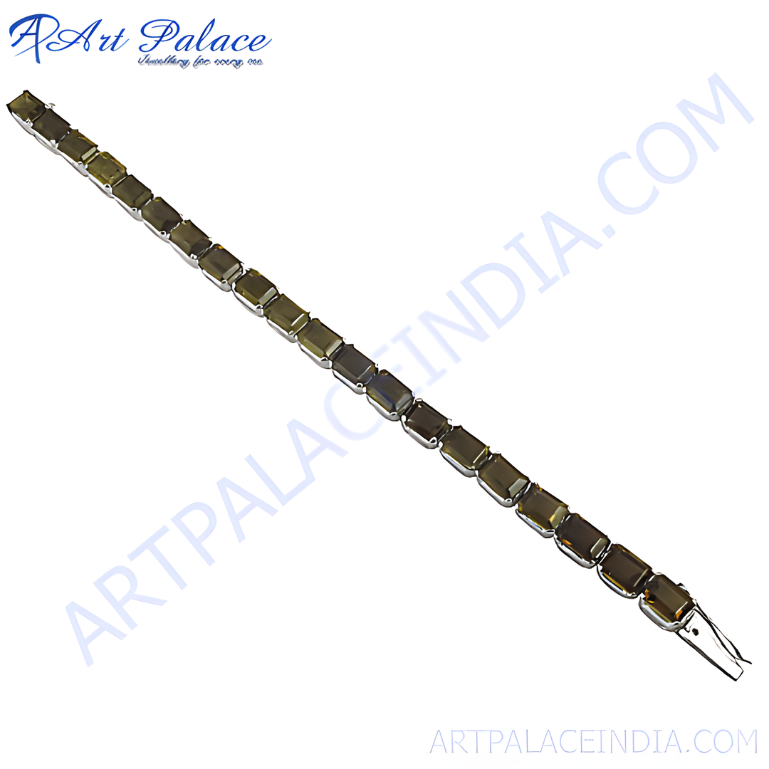 Silver chain bracelet with rectangular, emerald-cut green gemstones for women.