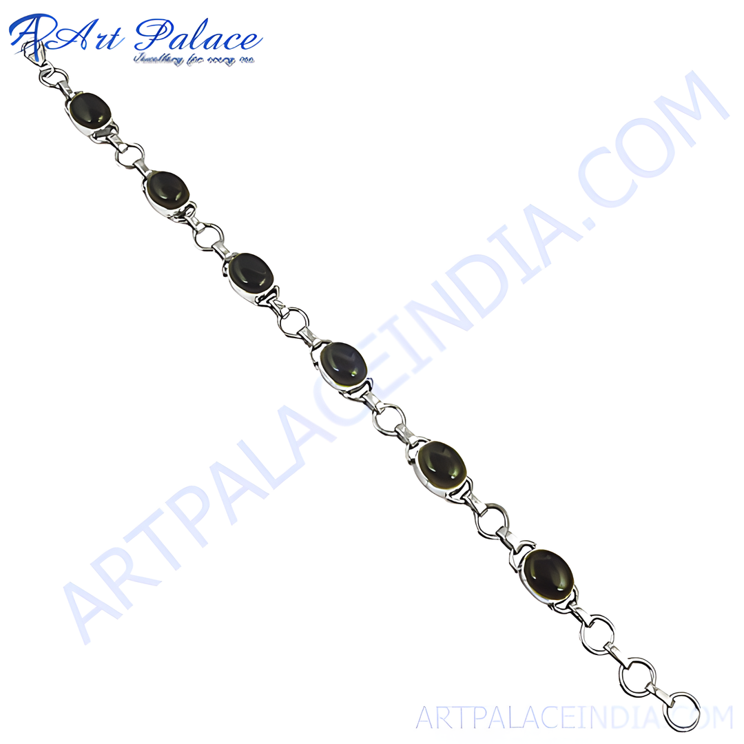 925 sterling silver chain bracelet with oval-shaped black onyx stones, perfect for elegant wear.
