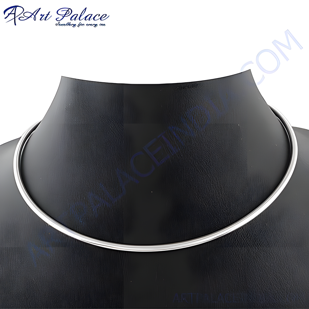 A sleek silver choker necklace made of 925 sterling silver, displayed against a black mannequin.