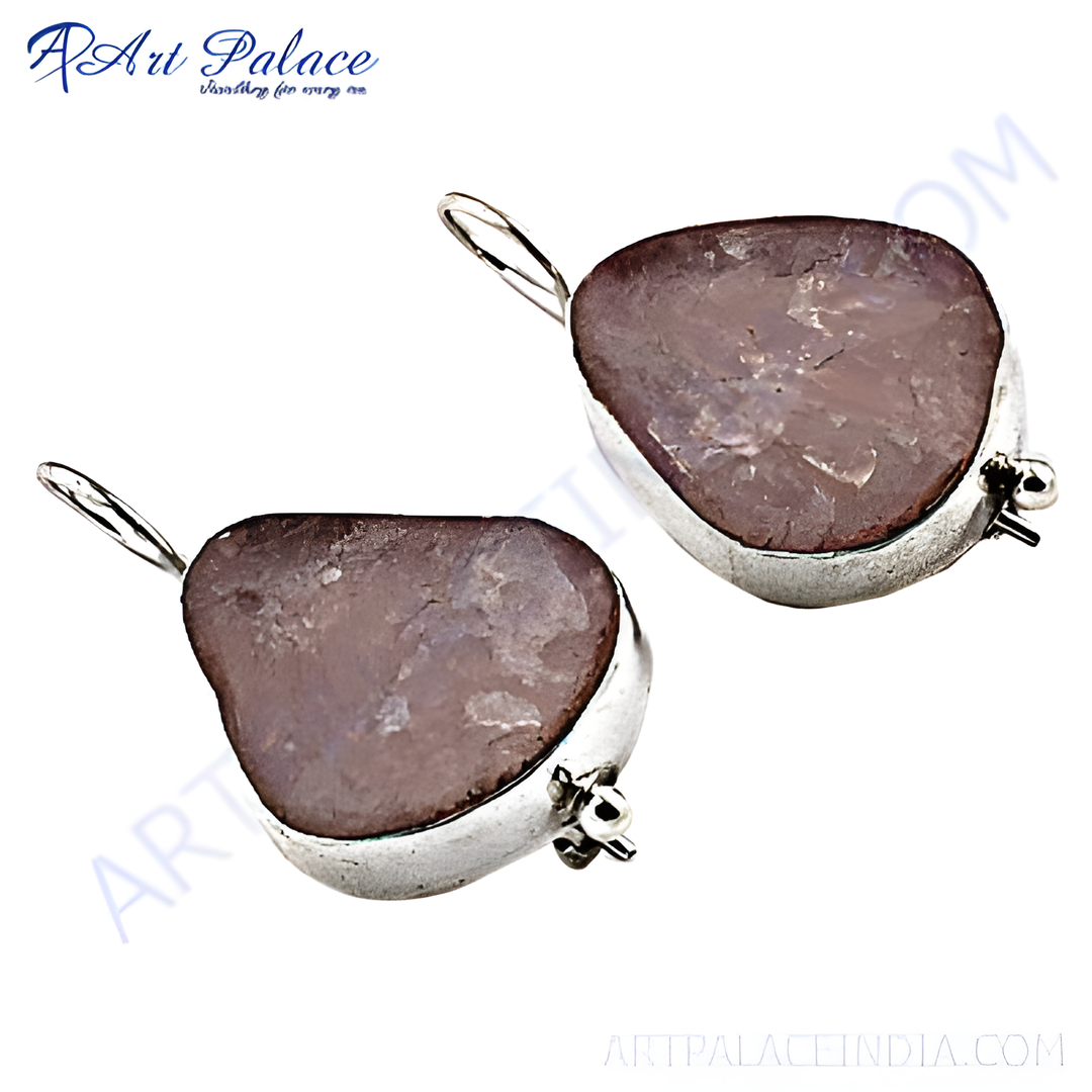 Sterling silver druzy stone dangle earrings with pinkish-purple gemstones, set in a silver bezel