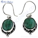 Load image into Gallery viewer, 925 sterling silver drop earrings featuring oval-cut emerald gemstones in a setting.
