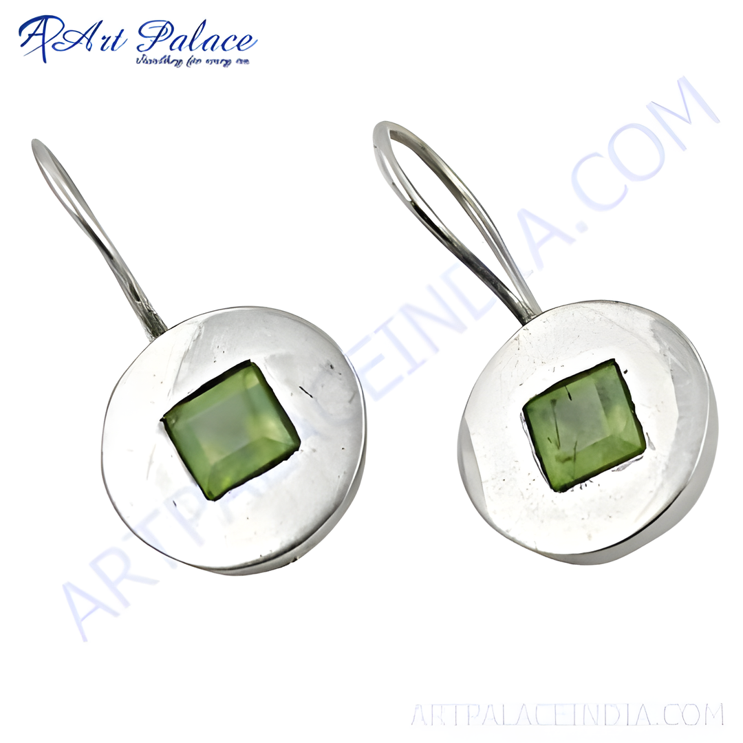 925 sterling silver drop earrings featuring a square cut peridot gemstone, showcasing a vibrant green hue.