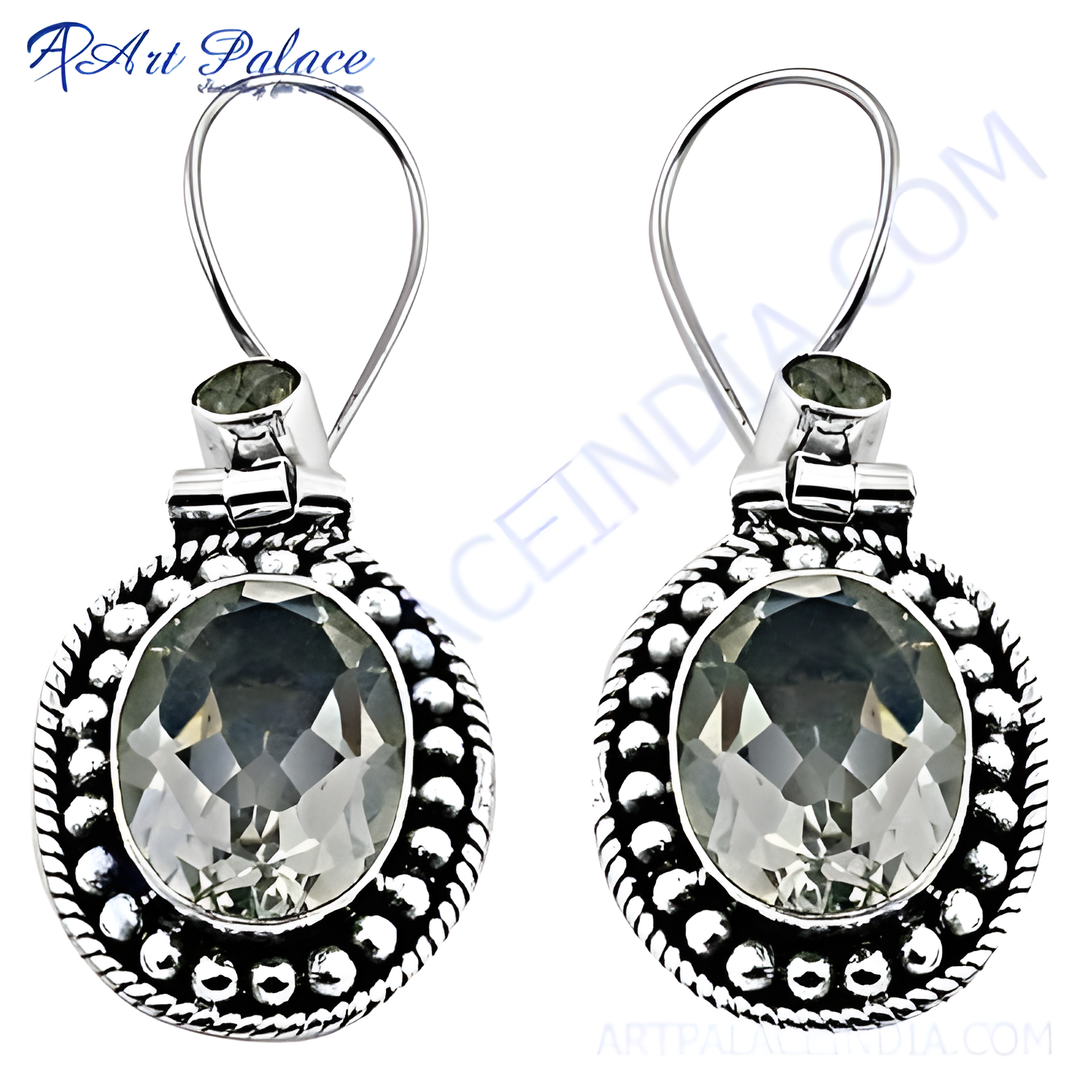 925 sterling silver dangle earrings featuring a large, sparkling gemstone center stone.