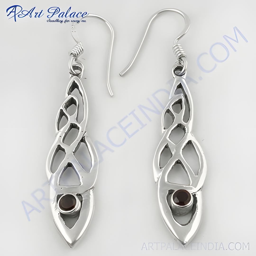 925 sterling silver dangle earrings with garnet gemstone accents. Elegant drop design for women.