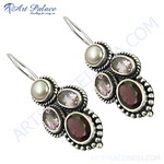 Load image into Gallery viewer, Sterling silver drop earrings featuring pearl and gemstone accents in a dangle design.
