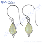 Load image into Gallery viewer, 925 sterling silver dangle earrings with a pear-shaped moonstone in a silver setting.
