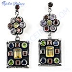 Load image into Gallery viewer, 925 sterling silver dangle earrings featuring a floral top and square bottom adorned with colorful gemstones.
