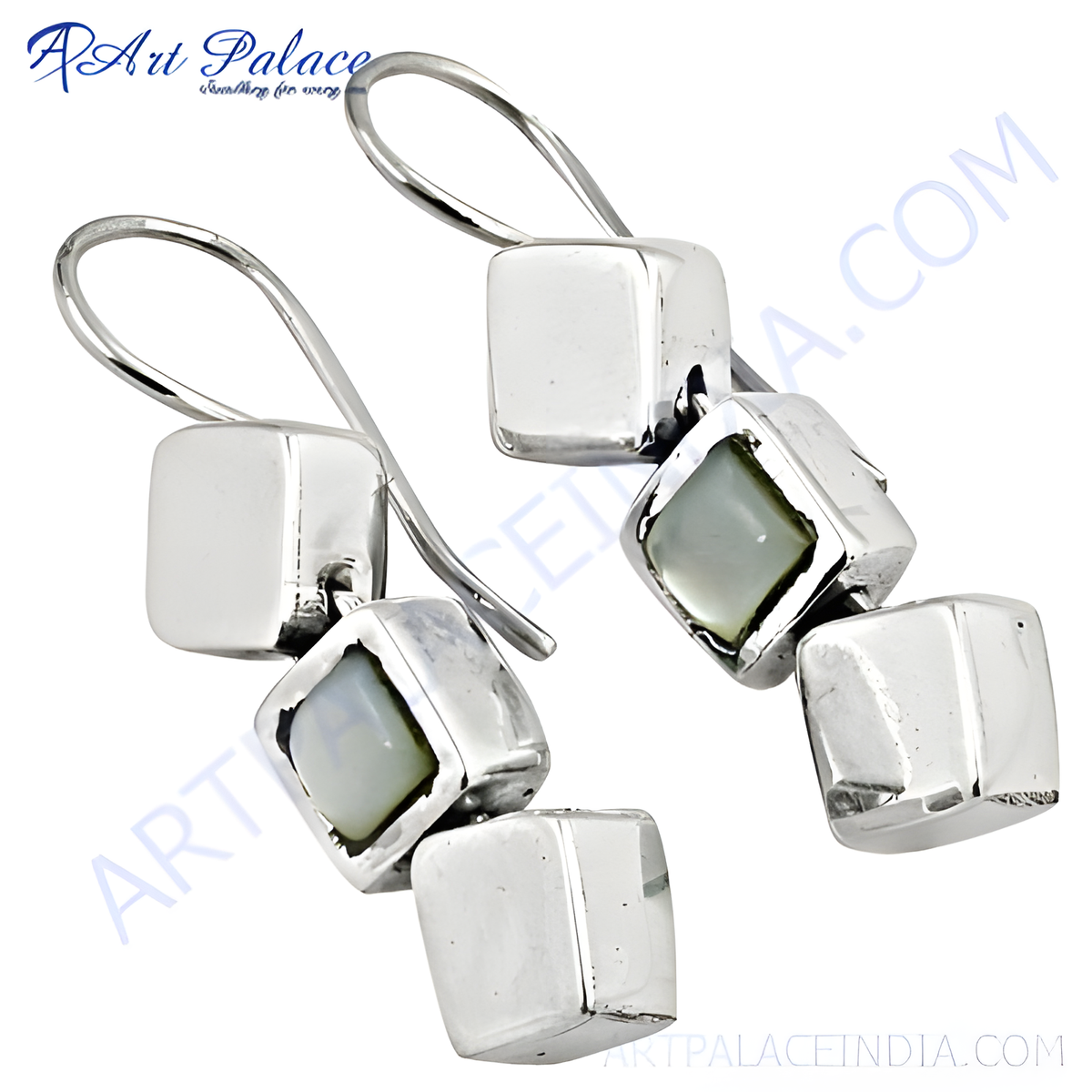 Sterling silver drop earrings featuring cube design with mother of pearl accents, showcasing modern geometric style