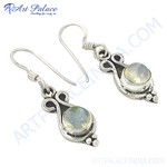 Load image into Gallery viewer, 925 sterling silver dangle earrings featuring round moonstone gemstones, with a hook style closure. Elegant silver earrings.
