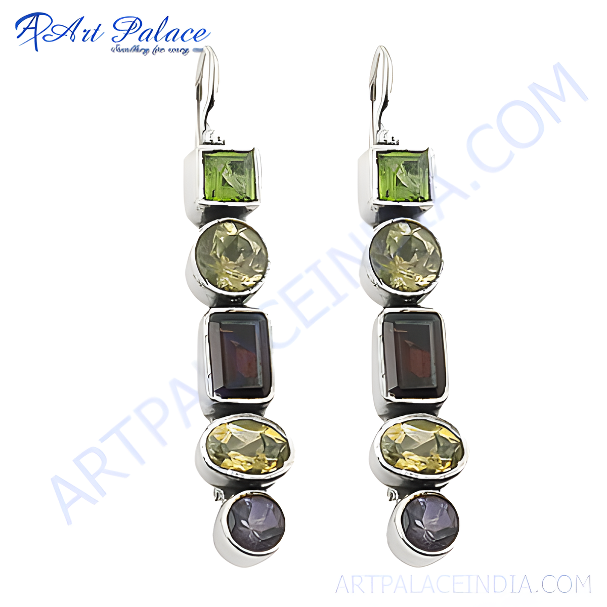 Sterling silver drop earrings featuring green peridot and dark red garnet gemstones in a dangling design