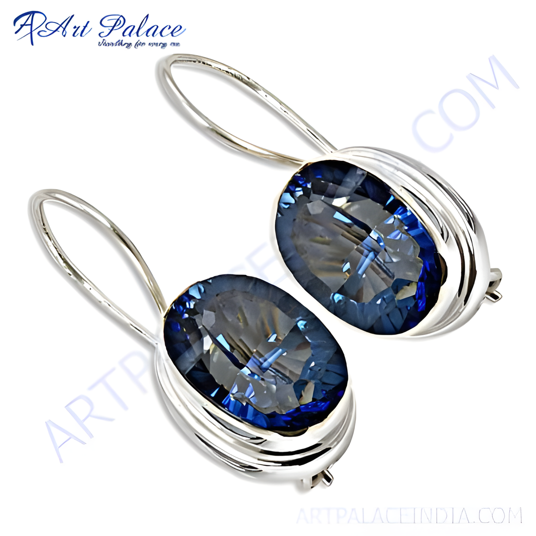 Silver drop earrings with oval blue gemstones. Elegant and stylish earrings.