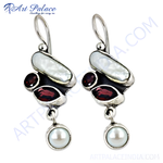 Load image into Gallery viewer, Sterling silver dangle earrings with white pearl and red garnet gemstones, suitable for women.
