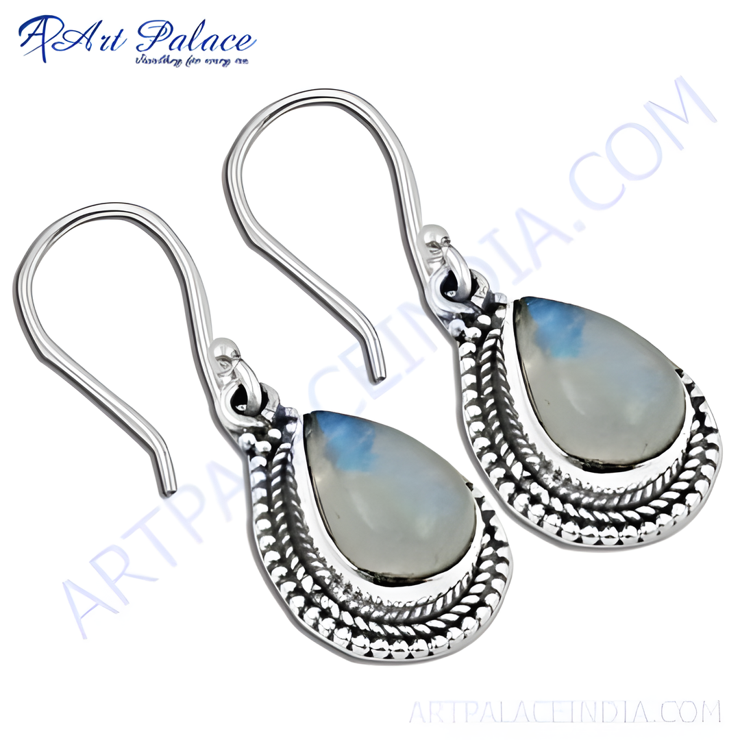 925 sterling silver dangle earrings featuring teardrop-shaped moonstone gemstones. Silver hook earrings.