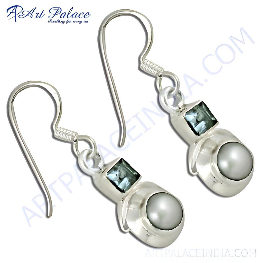 925 sterling silver dangle earrings with pearl and square blue gemstone accents.