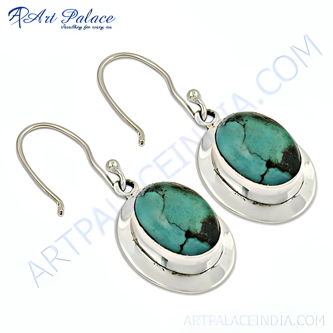 Sterling silver drop earrings with oval turquoise gemstones and hook closures