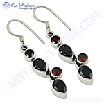 Load image into Gallery viewer, Sterling silver drop earrings featuring black and red garnet gemstones.
