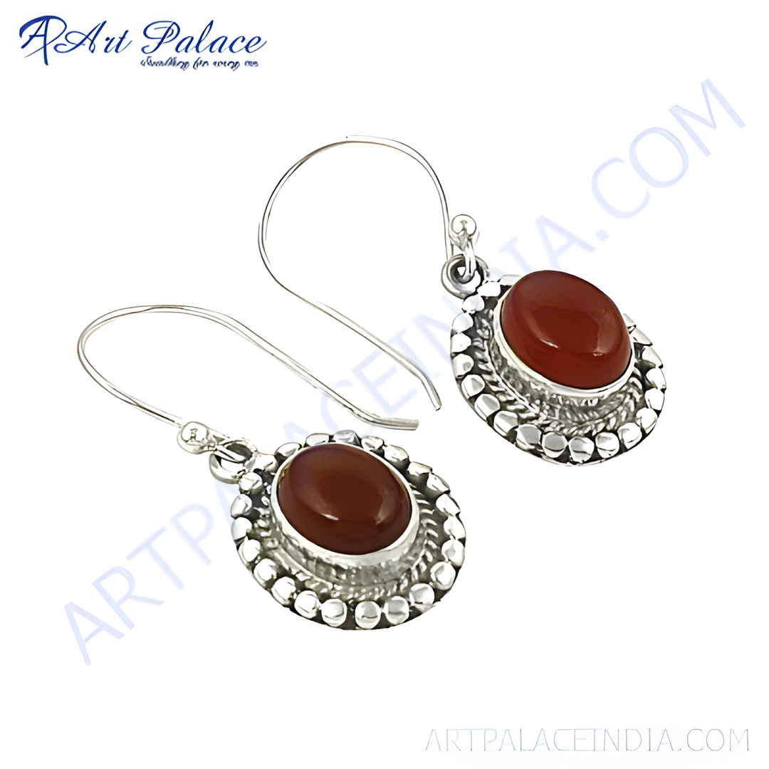 925 sterling silver dangle earrings with oval-shaped carnelian gemstones, showcasing an elegant design.