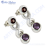 Load image into Gallery viewer, Sterling silver drop earrings featuring garnet at the post and amethyst at the drop, showcasing a classic design.
