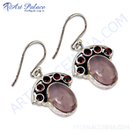 Load image into Gallery viewer, 925 sterling silver dangle earrings with a large rose quartz gemstone and accented by smaller red garnet gemstones
