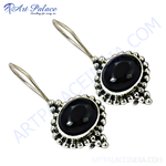 Load image into Gallery viewer, Sterling silver dangle earrings with oval black onyx gemstones, perfect for any occasion.
