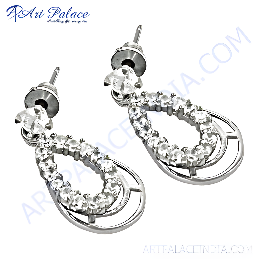 Sterling silver teardrop stud earrings with sparkling white cubic zirconia gemstones, perfect for any occasion.