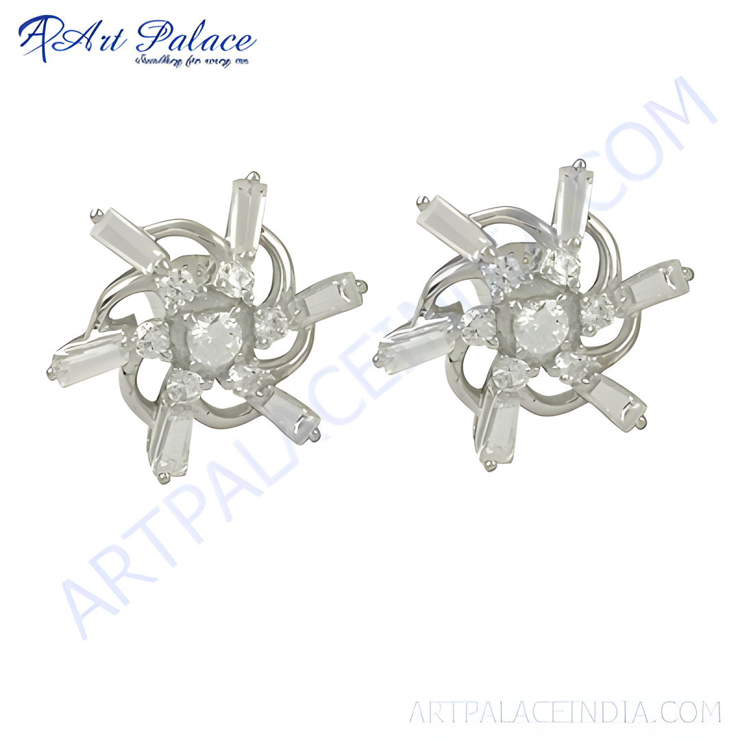 Silver stud earrings featuring a flower design with brilliant cubic zirconia stones.