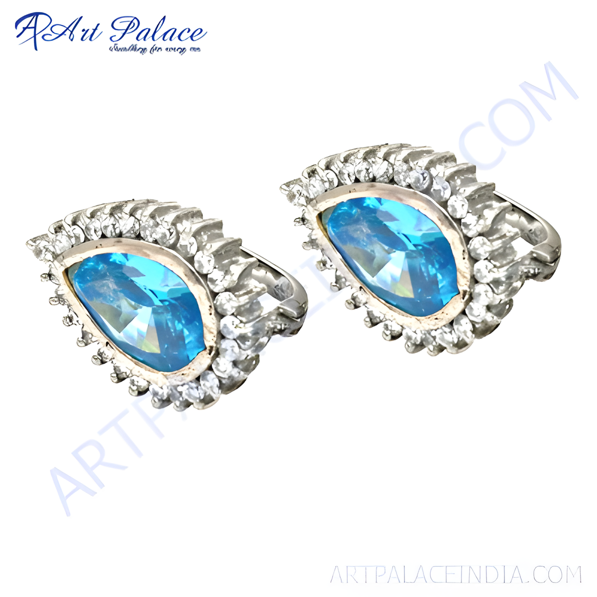 Sterling silver stud earrings featuring a large blue gemstone, surrounded by smaller clear gemstones