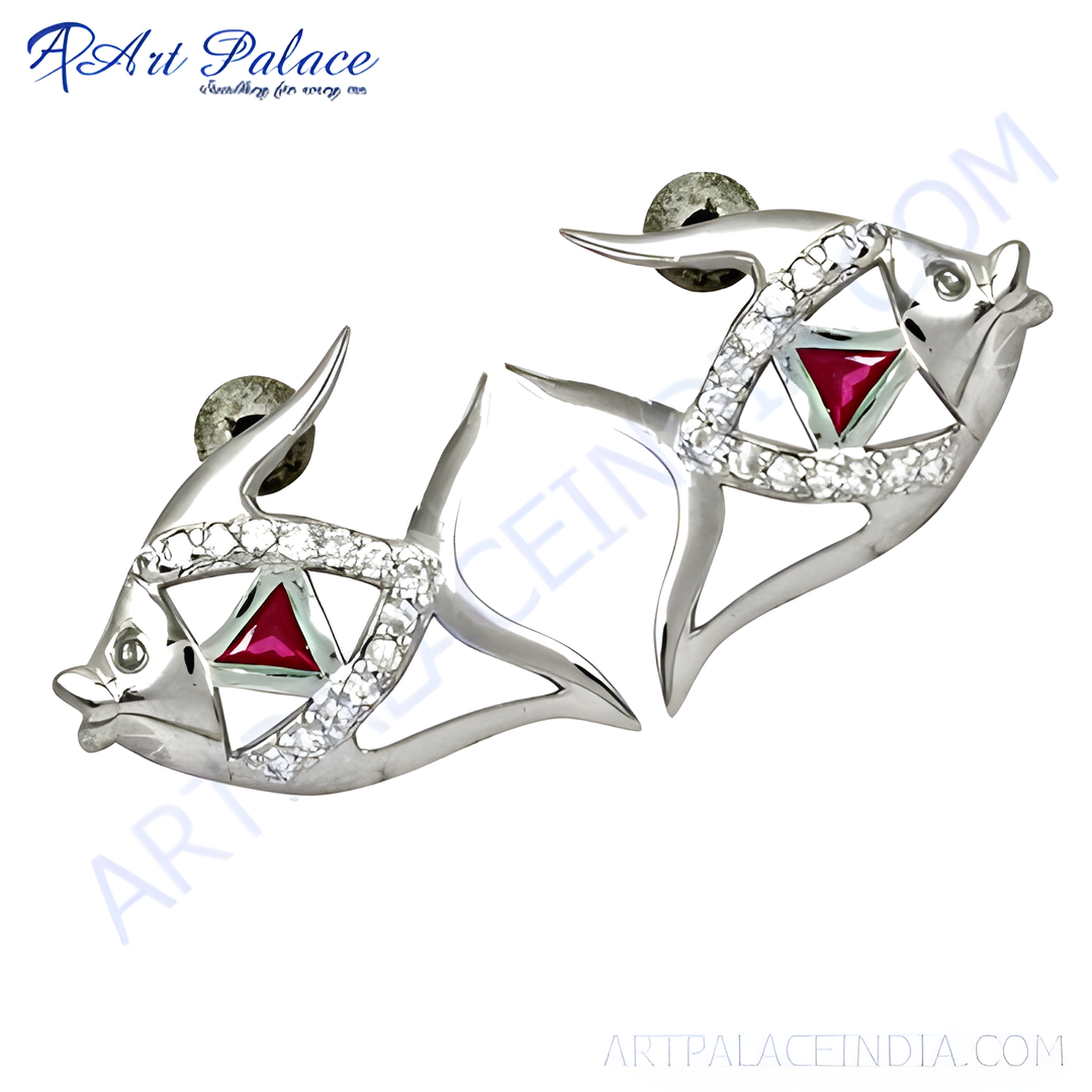 Sterling silver fish stud earrings featuring a vibrant ruby gemstone, perfect for women.