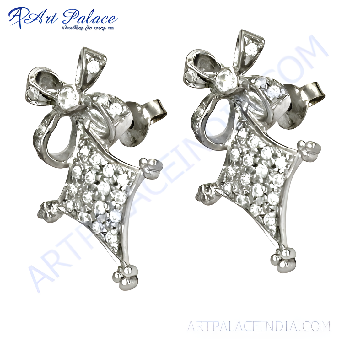 Sterling silver stud earrings with bow design and shimmering cubic zirconia stones.