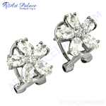 Load image into Gallery viewer, Floral stud earrings with sparkling cubic zirconia stones, set in polished metal, women&#39;s fashion jewelry.
