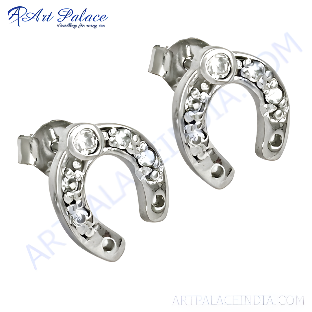 Sterling silver horseshoe stud earrings with clear cubic zirconia stones.