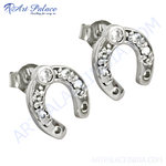 Load image into Gallery viewer, Sterling silver horseshoe stud earrings with clear cubic zirconia stones.
