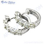 Load image into Gallery viewer, Silver hoop earrings with marquise-cut cubic zirconia stones.
