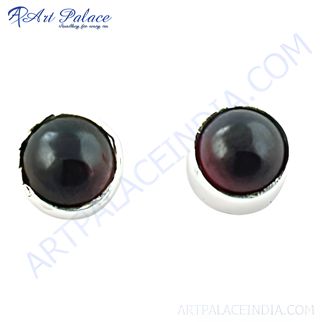 Silver stud earrings with round black gemstones. Elegant and classic design for women.