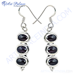 Load image into Gallery viewer, Sterling silver drop earrings with three oval-shaped black onyx gemstones.
