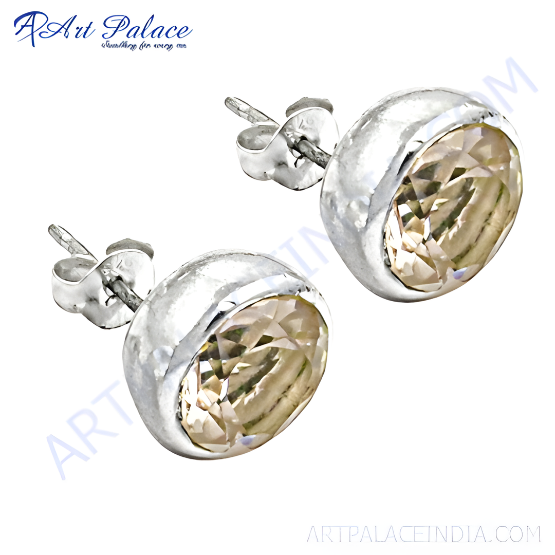 Silver stud earrings with champagne colored cubic zirconia gemstone. Elegant and timeless design.