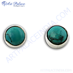 Load image into Gallery viewer, Sterling silver stud earrings with round turquoise gemstones. Turquoise color and minimalist design.
