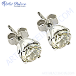 Load image into Gallery viewer, Silver stud earrings with round-cut diamonds, sparkling white gemstone, and a classic design
