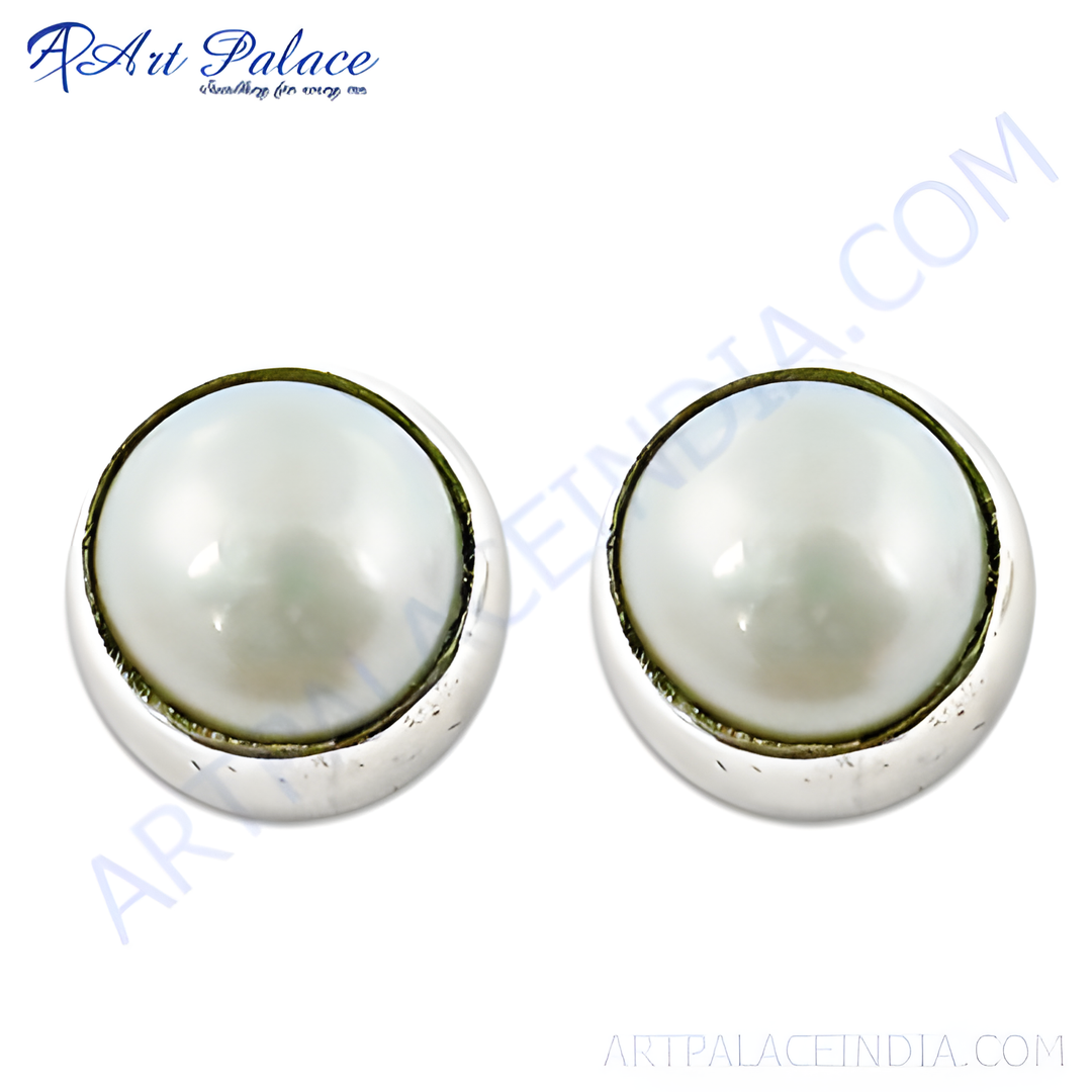 Round pearl stud earrings in silver setting, classic jewelry for women