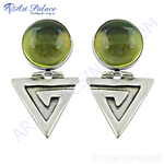 Load image into Gallery viewer, Silver drop earrings with geometric design and green gemstone accents.
