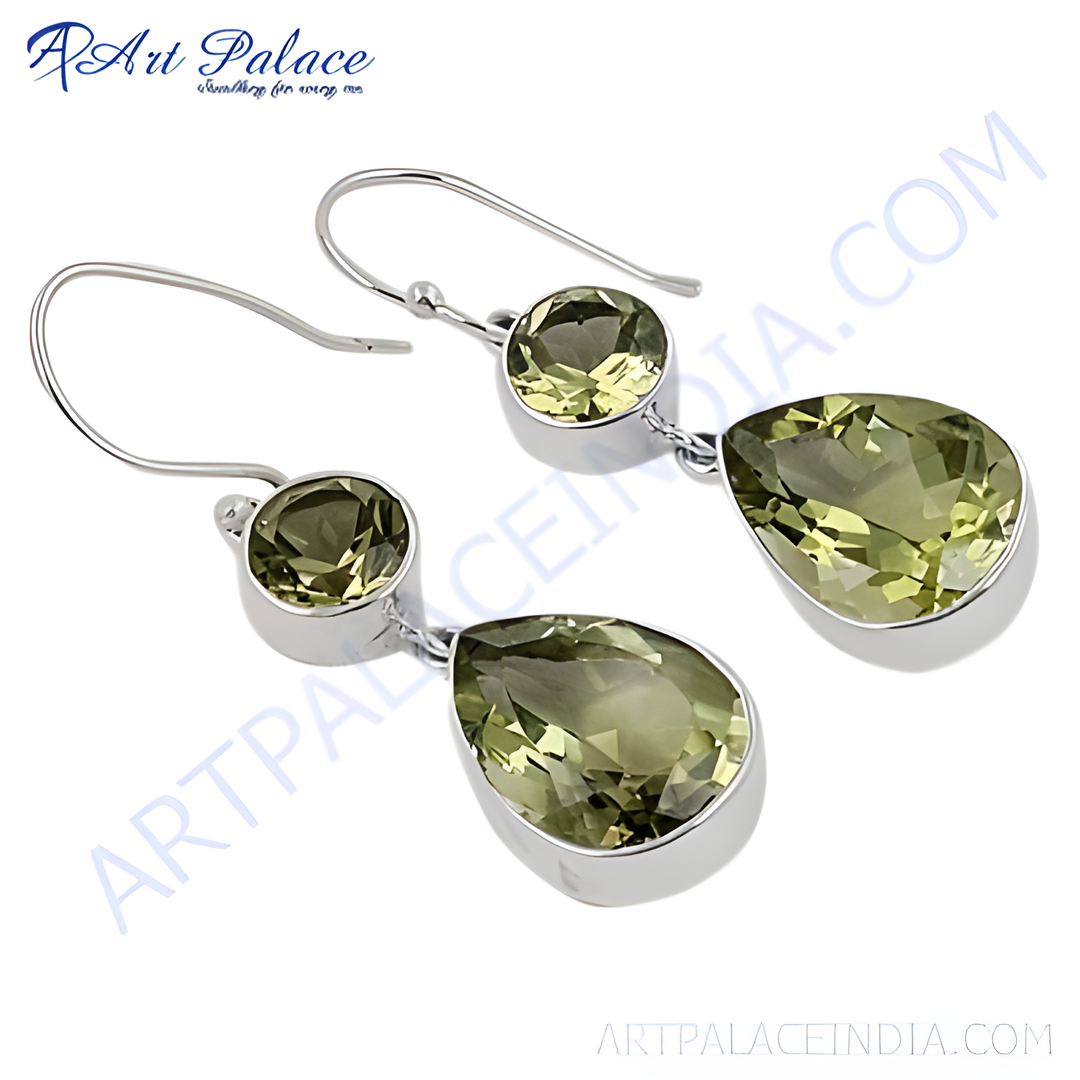 Sterling silver dangle earrings featuring green amethyst gemstones in a teardrop design.