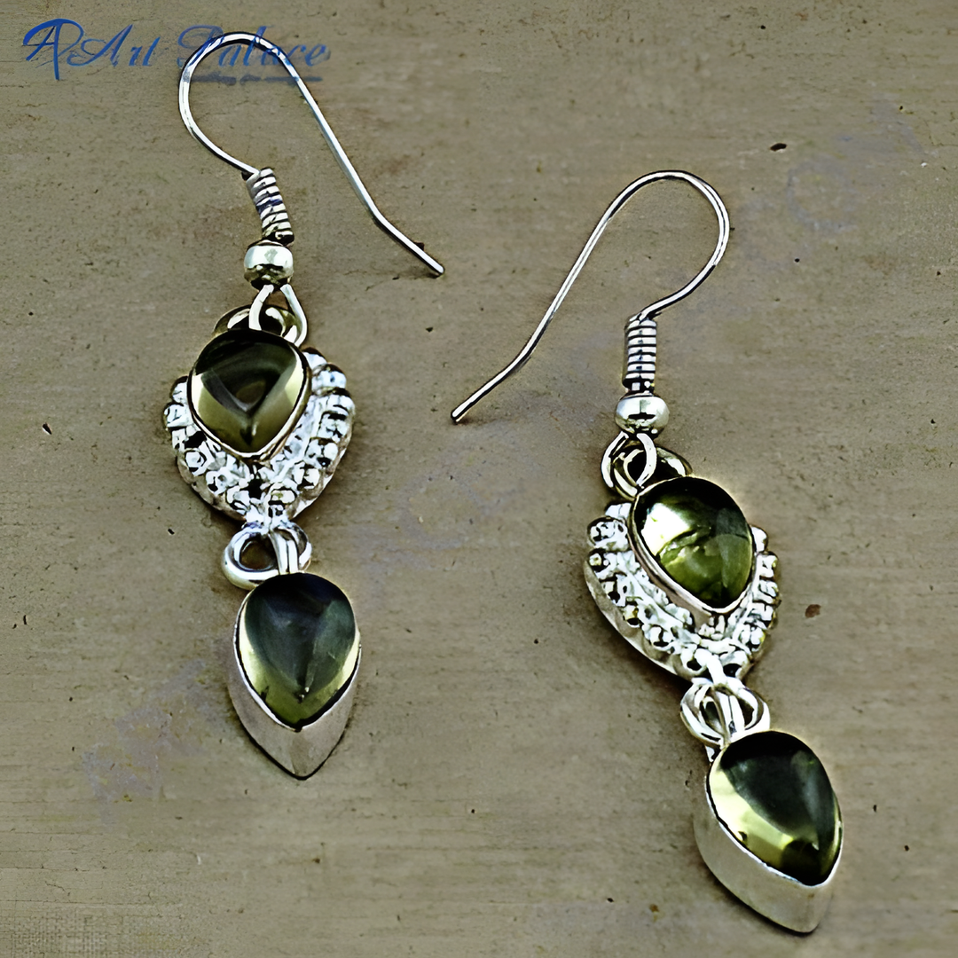 925 sterling silver drop earrings featuring oval-cut green peridot gemstones.