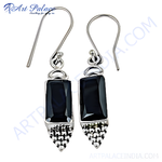 Load image into Gallery viewer, 925 sterling silver dangle earrings with rectangular black onyx gemstones and a hook closure.
