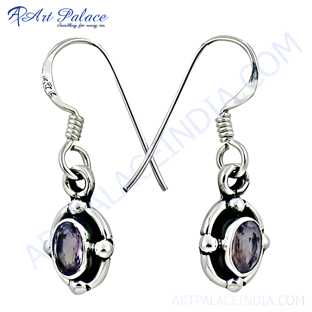 925 sterling silver drop earrings featuring oval amethyst gemstones, set in a polished silver setting.