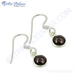 Load image into Gallery viewer, 925 sterling silver drop earrings with round garnet gemstones, a deep red color.
