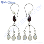 Load image into Gallery viewer, 925 sterling silver dangle earrings featuring garnet and moonstone gemstones.

