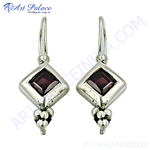 Load image into Gallery viewer, 925 sterling silver drop earrings with square cut red garnet gemstones and silver accents.
