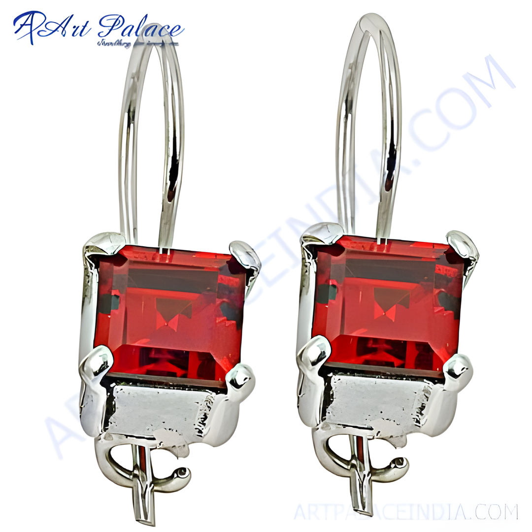 Sterling silver dangle earrings with a vibrant red gemstone center, perfect for women's fashion