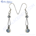 Load image into Gallery viewer, 925 sterling silver drop earrings featuring moonstone gemstones and a sleek, modern design.
